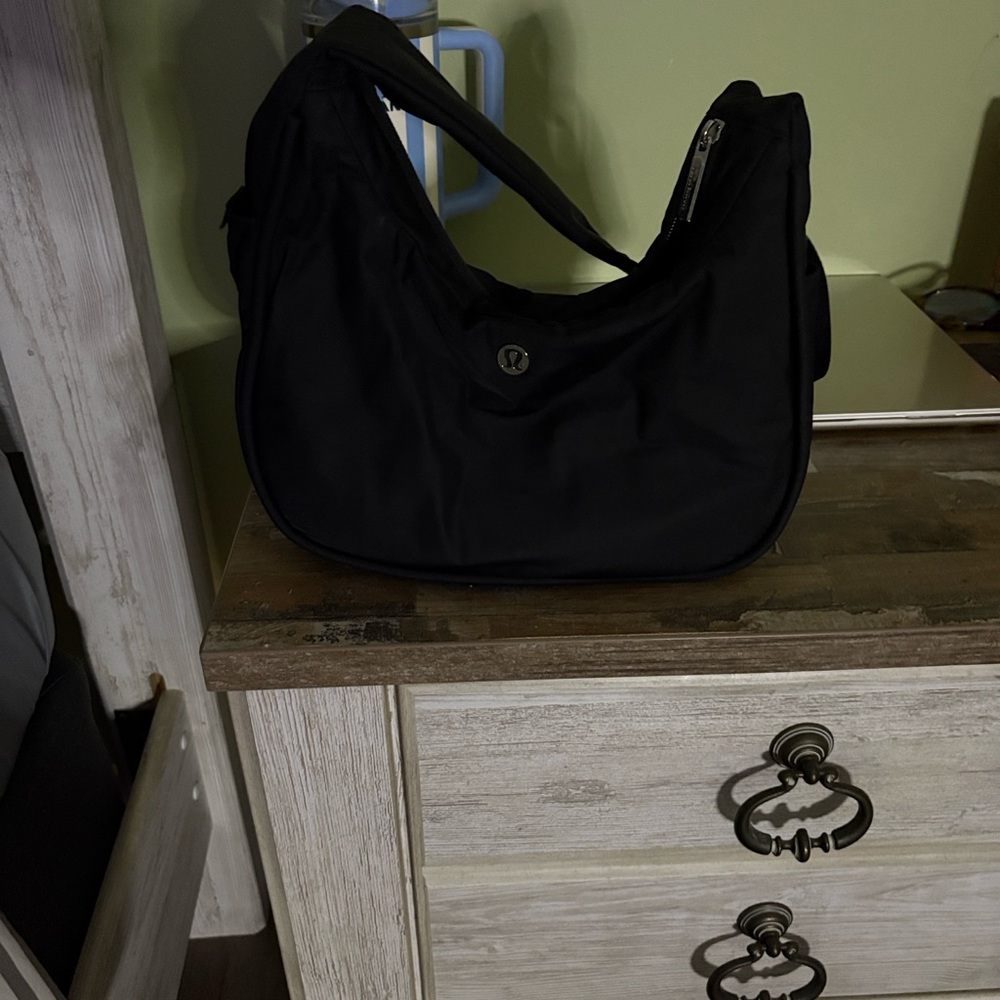 Lululemon Black Shoulder Bag with side pockets